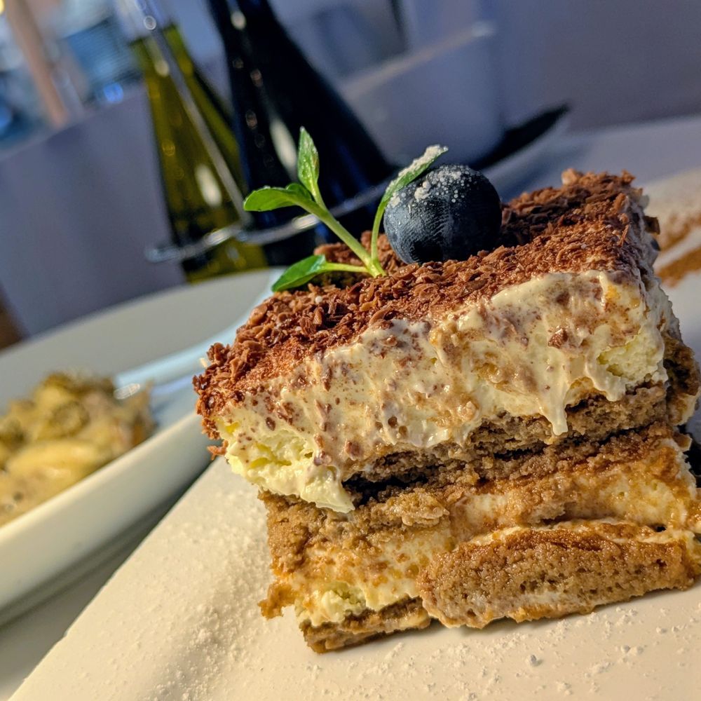 Oliver's Osteria - Tiramisú: Layered espresso-soaked cake, mascarpone cream, cacao - Italian Near Me - Laguna Beach, California