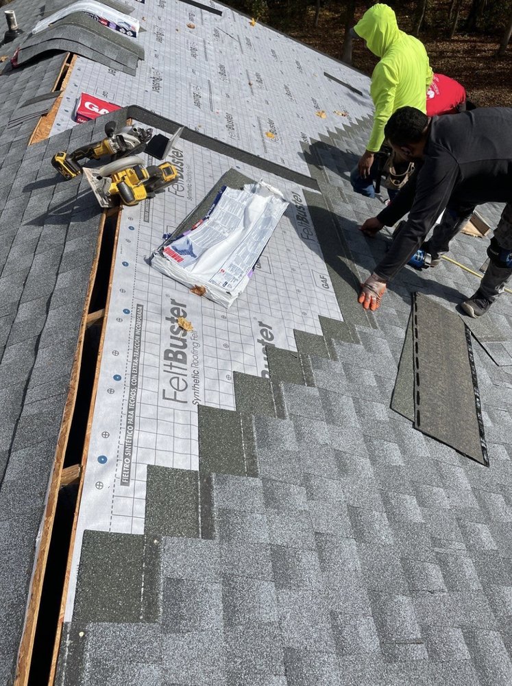 Slide of Green Group Roofing