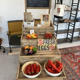 At the farm stand there is seasonal fruits and vegetables from the owner farm.