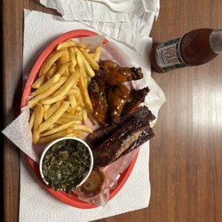 Pig Pen and Watering Hole - Ribs wings fries and greens with a sweet tea of course