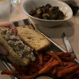 Chicken salad sandwich with sweet potato fries, Brussels sprouts and a mandarin salad, absolutely delicious!