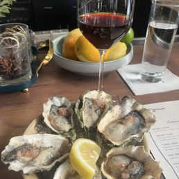 $1/oyster (6 max per person) at happy hour and house wine (half off a bottle)