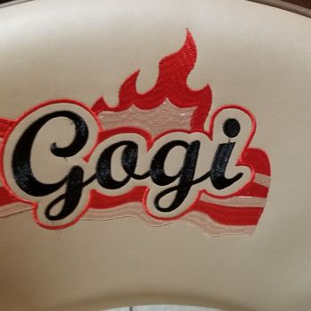 Korean Gogi Grill - The embroidered logo on the chair - Barbeque Near Me - Orlando, Florida