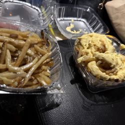 Burger Mojo - Mojo cheesy Monday fries. Left side shows queso & right is American cheesy.