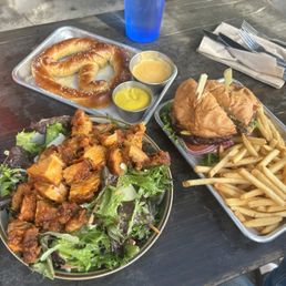 Soft pretzel, burger with fries, buffalo chicken salad Soft pretzel, burger with fries, buffalo chicken salad