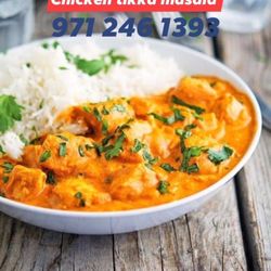 Dhaba Indian Kitchen - Chicken tikka masala with garlic naan and Indian basmati rice...