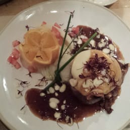 Delicious Filetto Di Manzo. Lardo wrapped beef fillet, scarmoza, tomato, Barolo jus, orange infused mash and flaked almonds