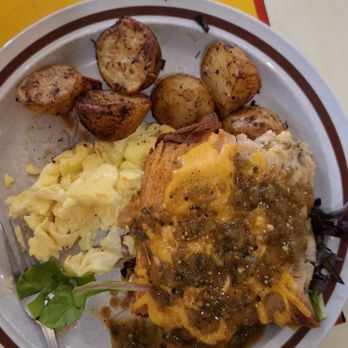 The Toasted Owl Cafe - eggs, seasoned potatoes, beef & veggie tamales (cheese/salsa topping) - Breakfast & Brunch Near Me - Flagstaff, Arizona The Toasted Owl Cafe - eggs, seasoned potatoes, beef & veggie tamales (cheese/salsa topping) - Breakfast & Brunch Near Me - Flagstaff, Arizona