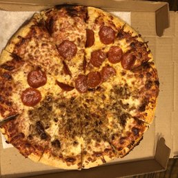 Half pepperoni and sausage pizza.