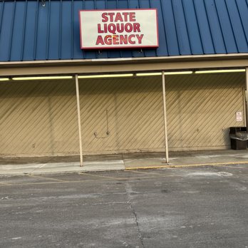 Community Markets - a state liquor agent sign on a building - Grocery Near Me - New Carlisle, Ohio Community Markets - a state liquor agent sign on a building - Grocery Near Me - New Carlisle, Ohio