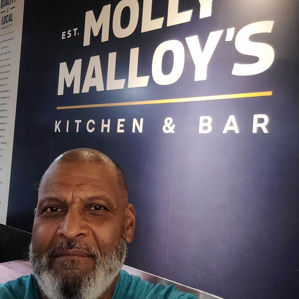 Molly Malloy's - Me in front of the establishment sign - Gastropubs Near Me - Philadelphia, Pennsylvania Molly Malloy's - Me in front of the establishment sign - Gastropubs Near Me - Philadelphia, Pennsylvania