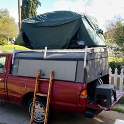 Ray's Towing - This my new camper shell with my tentcot penthouse! Should be on vacation. Not stuck in the Fresno heat with a bike/bus pass!
