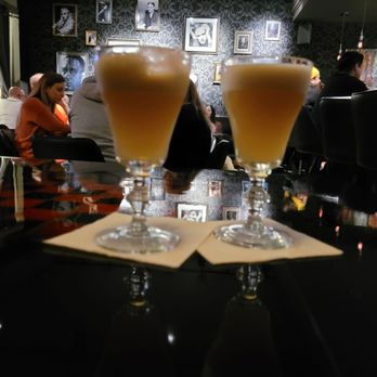Inkwell - two glasses of beer on a table - Cocktail Bars Near Me - Omaha, Nebraska Inkwell - two glasses of beer on a table - Cocktail Bars Near Me - Omaha, Nebraska