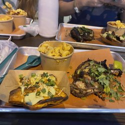 Jerk chicken with roasted sweet potatoes and Mac and cheese