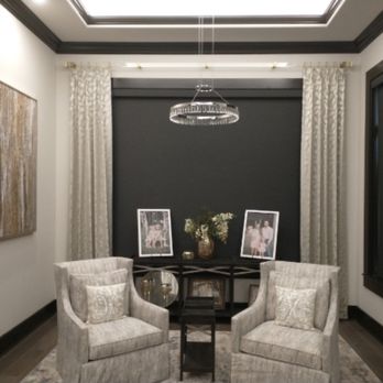 Terry's Interiors - Master sitting area with blackout roller shades and custom drapery panels. - Shutters Near Me Terry's Interiors - Master sitting area with blackout roller shades and custom drapery panels. - Shutters Near Me