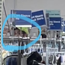 Screen shot of t he video. Clearly see him looking at us. His hat bill and glasses turned and his eyes in our direction.