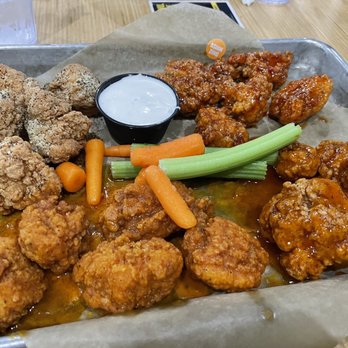 Buffalo Wild Wings - Bogo Boneless wings on Thursday. Sauces/seasoning: Asian zing, original Buffalo, lemon pepper, and mango habanero - Chicken Wings Near Me - Irvine, California Buffalo Wild Wings - Bogo Boneless wings on Thursday. Sauces/seasoning: Asian zing, original Buffalo, lemon pepper, and mango habanero - Chicken Wings Near Me - Irvine, California