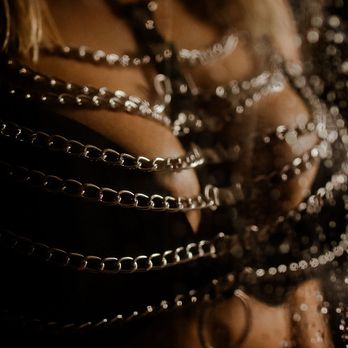 Bombshell Beauty Portraiture - Boudoir dark and moody shower scene set with chains and leather - Boudoir Photography Near Me Bombshell Beauty Portraiture - Boudoir dark and moody shower scene set with chains and leather - Boudoir Photography Near Me