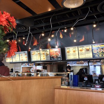 Harvey's - a vase of flowers in front of the counter - Burgers Near Me - Nepean, Ontario Harvey's - a vase of flowers in front of the counter - Burgers Near Me - Nepean, Ontario