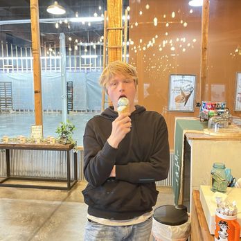The Milk House - Grandson enjoying waffle cone - Farms Near Me - Greenville, Illinois The Milk House - Grandson enjoying waffle cone - Farms Near Me - Greenville, Illinois