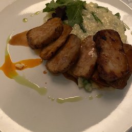 Pork with risotto.