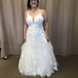 Dulcinea Tailoring and Alterations - My wonderful bride is ready for the big day! The dress shorter, front changed, a bustle added...1,2,3...done!