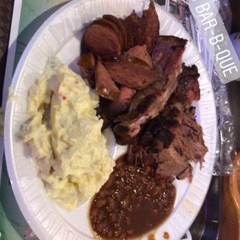 Jack's Bar-B-Que - Bbq brisket, smoked sausage, St. Louise style ribs. With side of potato salad and baked beans. - Barbeque Near Me - Nashville, Tennessee Jack's Bar-B-Que - Bbq brisket, smoked sausage, St. Louise style ribs. With side of potato salad and baked beans. - Barbeque Near Me - Nashville, Tennessee