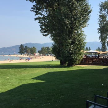Trinity At City Beach - the outside deck eating area - American Near Me - Sandpoint, Idaho