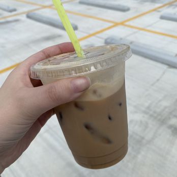 The Addiction - a hand holding a cup of iced coffee - Coffee & Tea Near Me - Aransas Pass, Texas The Addiction - a hand holding a cup of iced coffee - Coffee & Tea Near Me - Aransas Pass, Texas