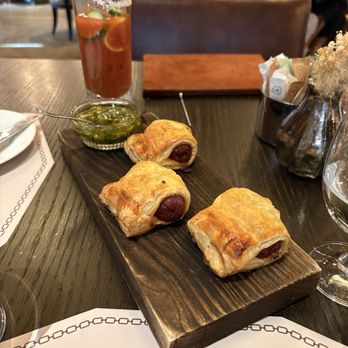 Bricks and Horses - Pigs in blanket with homemade jalapeño cheese sausage. Our fav! - Breakfast & Brunch Near Me - Fort Worth, Texas