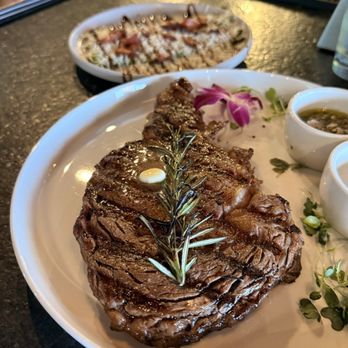 Cured Restaurant - Rib-Eye Steak aged in butter & rosemary (12 oz) - Steakhouses Near Me - Louisville, Kentucky Cured Restaurant - Rib-Eye Steak aged in butter & rosemary (12 oz) - Steakhouses Near Me - Louisville, Kentucky