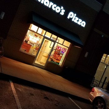 Marco's Pizza - a car parked in front of a store - Pizza Near Me - Raleigh, North Carolina Marco's Pizza - a car parked in front of a store - Pizza Near Me - Raleigh, North Carolina