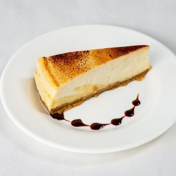 Leone's Trattoria - a piece of cheesecake on a plate - Italian Near Me - North Brunswick, New Jersey Leone's Trattoria - a piece of cheesecake on a plate - Italian Near Me - North Brunswick, New Jersey