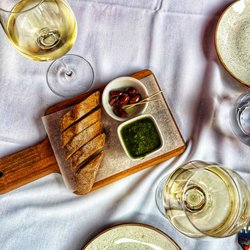 La Maison - Bread with olives and dip, and delicious French wines