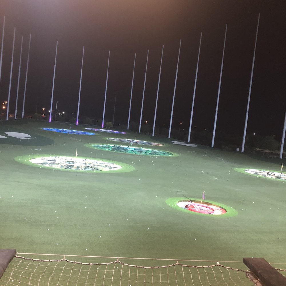 Topgolf - Course below us. We dined on tasty salad, wings, breast of chicken, and tacos. Sangria was delish! (I had bartender decrease its potency) - Golf Near Me - Gilbert, Arizona Topgolf - Course below us. We dined on tasty salad, wings, breast of chicken, and tacos. Sangria was delish! (I had bartender decrease its potency) - Golf Near Me - Gilbert, Arizona