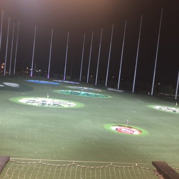 Topgolf - Course below us. We dined on tasty salad, wings, breast of chicken, and tacos. Sangria was delish! (I had bartender decrease its potency) - Golf Near Me - Gilbert, Arizona