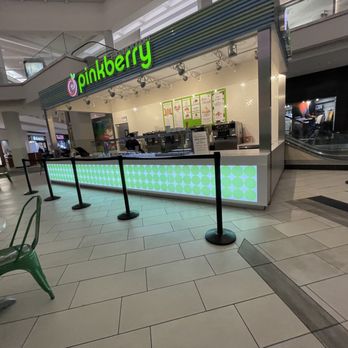 Pinkberry - the inside of a restaurant with a neon sign - Ice Cream & Frozen Yogurt Near Me - Austin, Texas