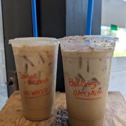 Two iced lattes from the specialty menu.