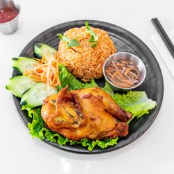 Culantro & Basil Pho Bistro - Cornish hen with red rice