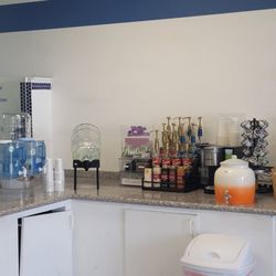 Purified Water To Go - Our complimentary beverage station. they take donations if you can