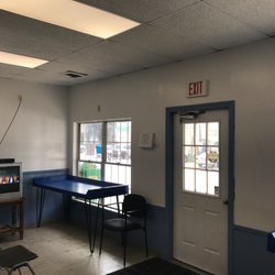 Generous waiting area with TV