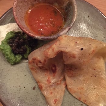 The Progress - Tomato curry 'roti' with ricotta & fava hummus - New American Near Me - San Francisco, California The Progress - Tomato curry 'roti' with ricotta & fava hummus - New American Near Me - San Francisco, California