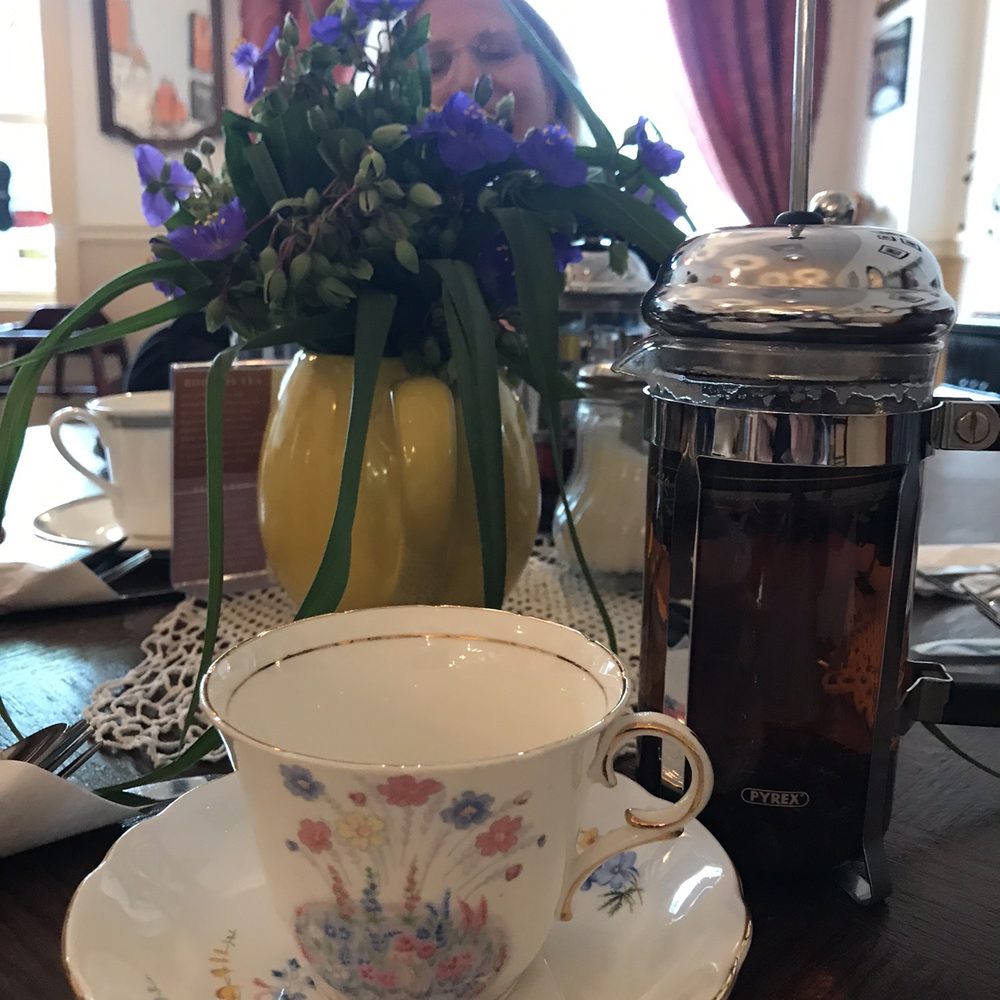 Open Door Tea - our table set with fresh flowers and china tea cups - Tea Rooms Near Me - Stratford, Connecticut