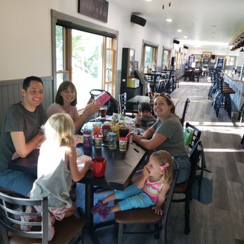Rose's Lakeside Pub - a family sitting at a table - Pubs Near Me - Markesan, Wisconsin Rose's Lakeside Pub - a family sitting at a table - Pubs Near Me - Markesan, Wisconsin