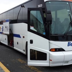 Bellair Charters & Airporter - This bus has a bathroom and seatbelts. Large luggage is stowed below. Smaller items can be placed in the compartment above your seat.