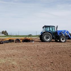 Wickersham Water Hauling - Tractor Discing.