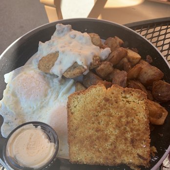 Honey Butter's Kitchen - Monticello - Chicken fried steak with garlic potatoes, eggs and cornbread. - American Near Me - Williamsburg, Virginia Honey Butter's Kitchen - Monticello - Chicken fried steak with garlic potatoes, eggs and cornbread. - American Near Me - Williamsburg, Virginia
