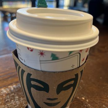 Starbucks - a starbucks cup with a face on it - Coffee & Tea Near Me - Burtonsville, Maryland