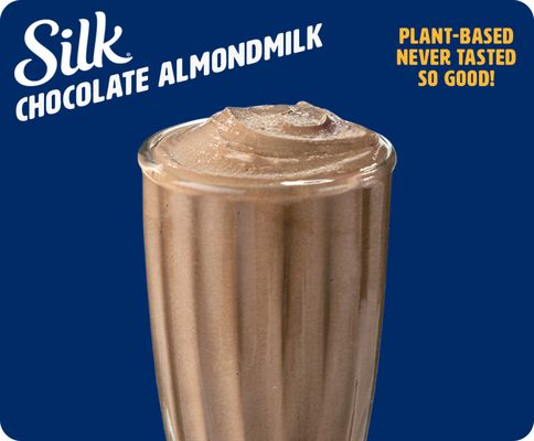 Plant-based lovers rejoice! Now offering Silk® Almondmilk items. - Introducing Cold Stone Creamery plant-based, frozen chocolate dessert made with Silk® Almondmilk! Get down and get crunchy by enjoying it in our Don’t Cry Over Spilled Silk Creation – Silk® Chocolate Almondmilk Frozen Dessert, Banana, Peanut Butter & Roasted Almonds, try it in our Very Berry Non-Dairy™ Creation - Silk® Chocolate Almondmilk frozen dessert, mixed with Strawberries, Blueberries & Raspberries, or sip your plant-based treat with our Chocolate Silk® Shake - it’s Silk® Chocolate Almondmilk Frozen Dessert blended with Silk® Almondmilk. Plant-based lovers rejoice! Now offering Silk® Almondmilk items. - Introducing Cold Stone Creamery plant-based, frozen chocolate dessert made with Silk® Almondmilk! Get down and get crunchy by enjoying it in our Don’t Cry Over Spilled Silk Creation – Silk® Chocolate Almondmilk Frozen Dessert, Banana, Peanut Butter & Roasted Almonds, try it in our Very Berry Non-Dairy™ Creation - Silk® Chocolate Almondmilk frozen dessert, mixed with Strawberries, Blueberries & Raspberries, or sip your plant-based treat with our Chocolate Silk® Shake - it’s Silk® Chocolate Almondmilk Frozen Dessert blended with Silk® Almondmilk.