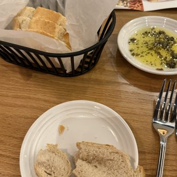 Carrabba's Italian Grill - Bread with olive oil and herbs - Italian Near Me - Davenport, Florida Carrabba's Italian Grill - Bread with olive oil and herbs - Italian Near Me - Davenport, Florida